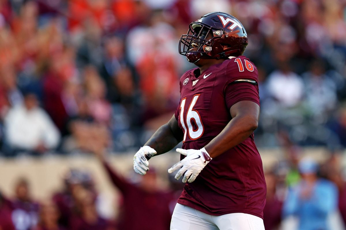 Sep 7, 2024; Blacksburg, Virginia, USA; Virginia Tech Hokies defensive lineman Aeneas Peebles (16) celebrates after a sack during the second quarter against the Marshall Thundering Herd at Lane Stadium. Mandatory Credit: Peter Casey-Imagn Images