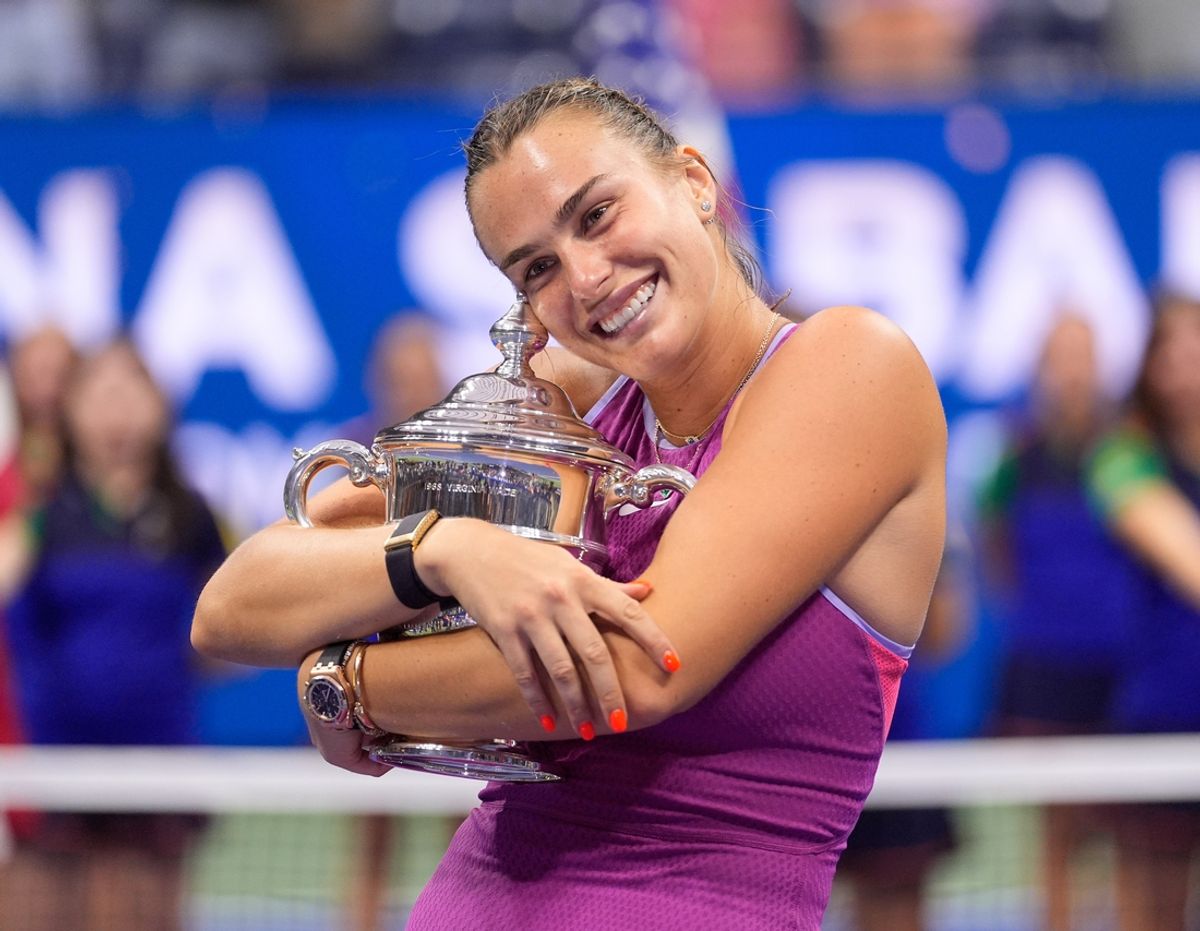 Sept 7, 2024; Flushing, NY, USA Aryna Sabalenka with the US Open Trophy after beating Jessica Pegula (USA) in the women's singles final on day thirteen of the 2024 U.S. Open tennis tournament at USTA Billie Jean King National Tennis Center. Mandatory Credit: Robert Deutsch-Imagn Images