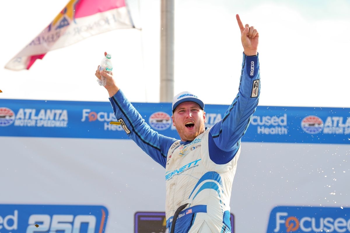 Sep 7, 2024; Hampton, Georgia, USA; Xfinity Series driver Austin Hill (21) celebrates his win on Victory Lane at Atlanta Motor Speedway. Mandatory Credit: Jason Allen-Imagn Images