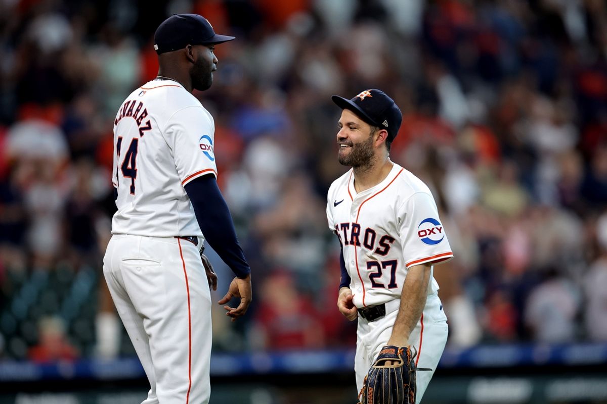 Sep 7, 2024; Houston, Texas, USA; Houston Astros left fielder Yordan Alvarez (44) and Houston Astros second baseman Jose Altuve (27) congratulate each other after the final out against the Arizona Diamondbacks during the ninth inning at Minute Maid Park. Mandatory Credit: Erik Williams-Imagn Images