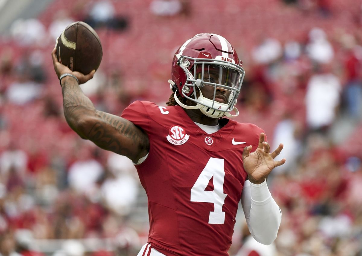Sep 7, 2024; Tuscaloosa, Alabama, USA;  Alabama Crimson Tide quarterback Jalen Milroe (4) throws during pregame warmups before a game against the South Florida Bulls at Bryant-Denny Stadium. Mandatory Credit: Gary Cosby Jr.-Imagn Images