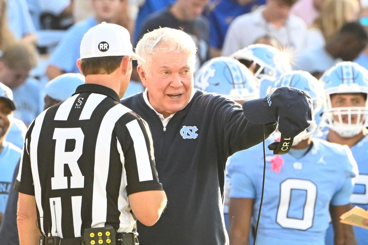 Sep 7, 2024; Chapel Hill, North Carolina, USA; North Carolina Tar Heels coach Mack Brown with the referee in the third quarter at Kenan Memorial Stadium. Mandatory Credit: Bob Donnan-Imagn Images