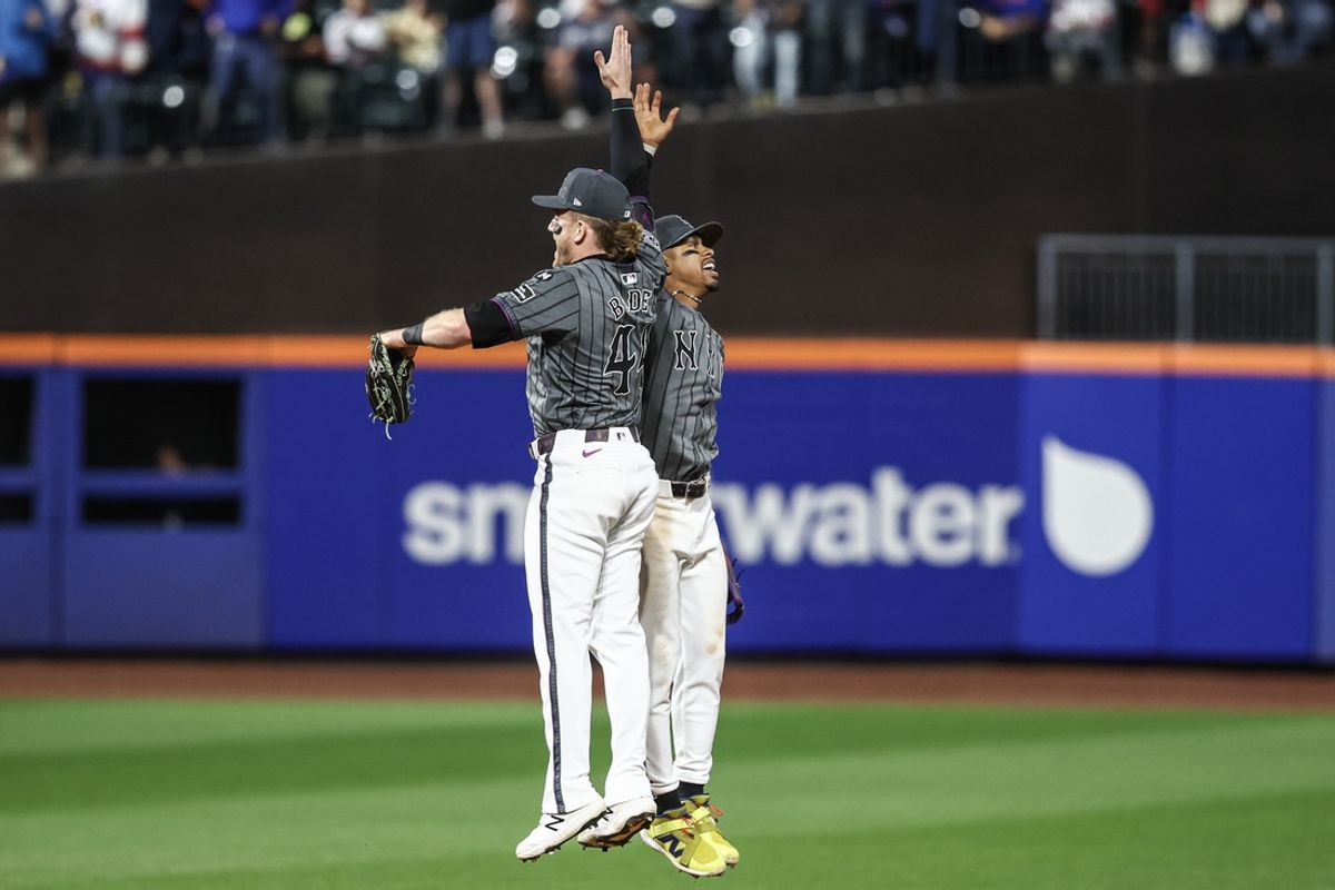 Sep 7, 2024; New York City, New York, USA;  New York Mets center fielder Harrison Bader (44) and shortstop Francisco Lindor (12) celebrate after defeating the Cincinnati Reds 4-0 at Citi Field. Mandatory Credit: Wendell Cruz-Imagn Images