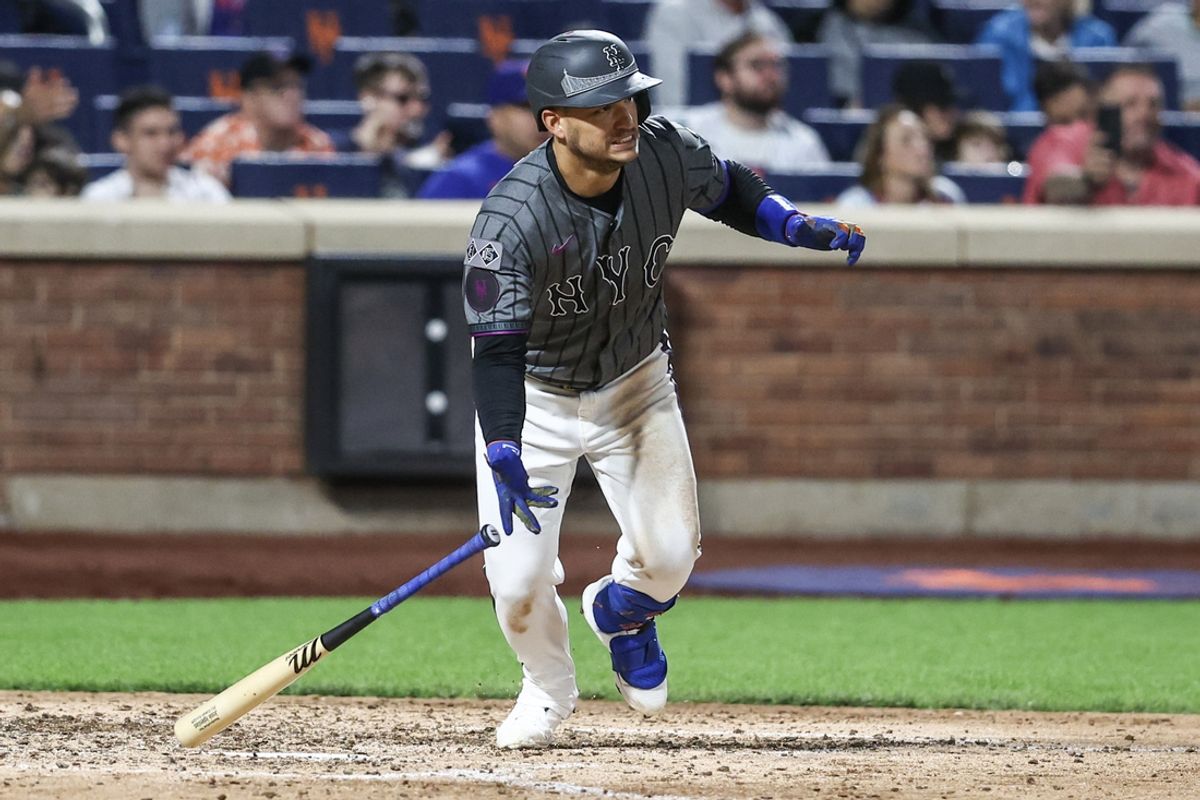 Sep 7, 2024; New York City, New York, USA;  New York Mets second baseman Jose Iglesias (11) hits a single in the eighth inning against the Cincinnati Reds at Citi Field. Mandatory Credit: Wendell Cruz-Imagn Images