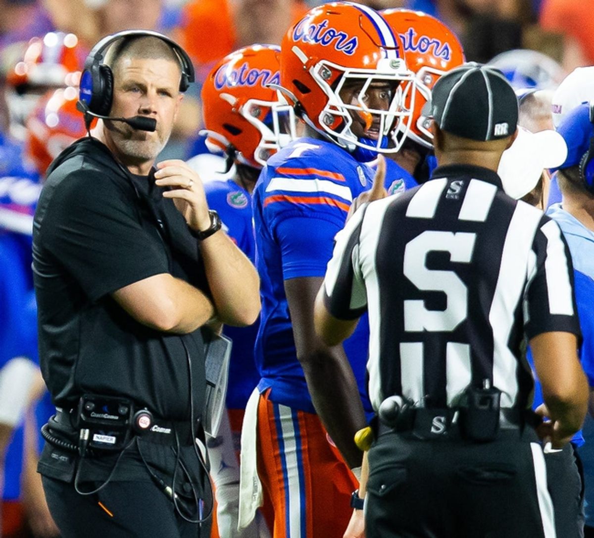 Florida Gators head coach Billy Napier talks with a sidelines official during the first half at Ben Hill Griffin Stadium in Gainesville, FL on Saturday, September 7, 2024 against the Samford Bulldogs. The Gators lead 14-0 at the half. [Doug Engle/Gainesville Sun]