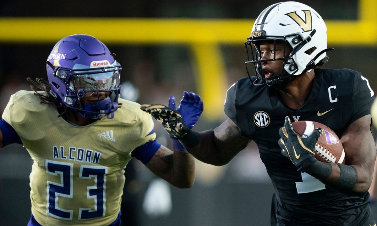 Alcorn State Braves linebacker Lannen Moore (23) tries to bring down Vanderbilt Commodores safety CJ Taylor (1) during their Southeastern Athletic Conference game at FirstBank Stadium in Nashville, Tenn., Saturday, Sept. 7, 2024.