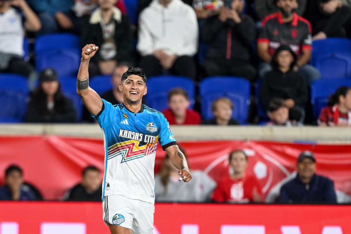 Sep 7, 2024; Harrison, New Jersey, USA; Sporting Kansas City forward Alan Pulido (9) celebrates his goal during the second half against New York Red Bulls at Red Bull Arena. Mandatory Credit: Mark Smith-Imagn Images