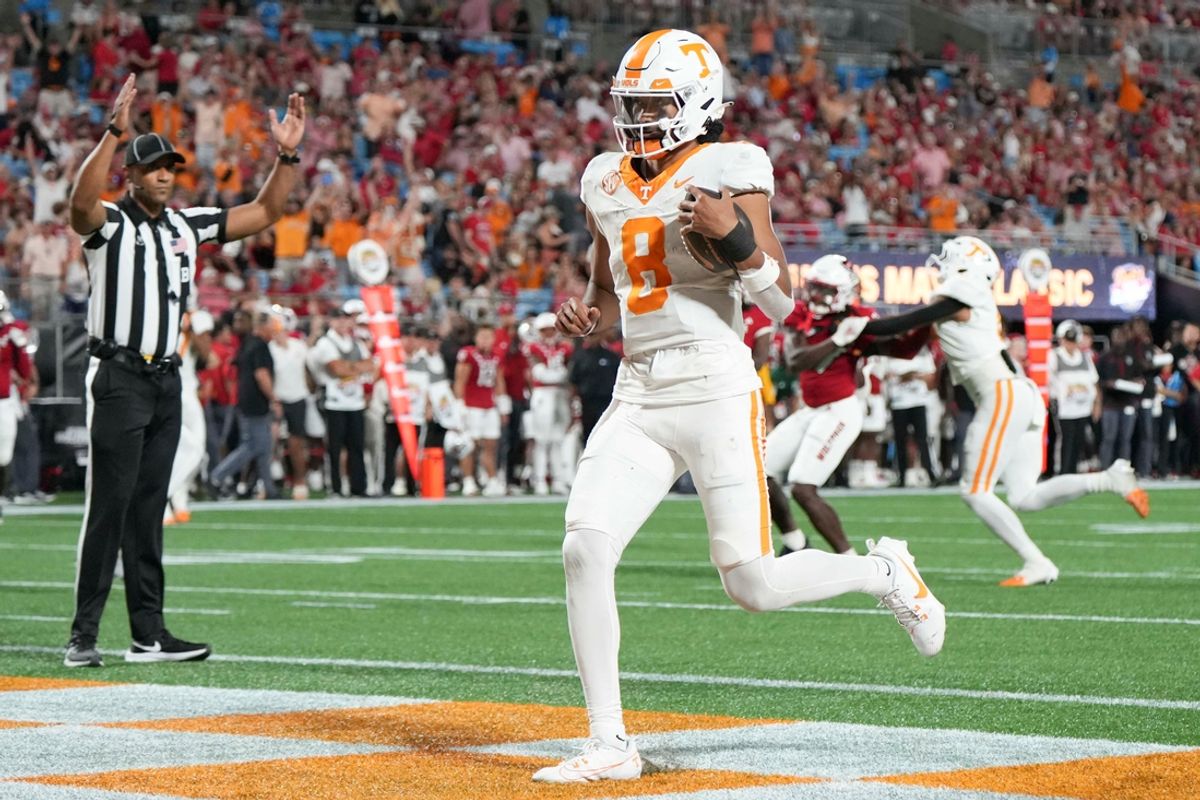 Tennessee quarterback Nico Iamaleava (8) runs into the end zone for a touchdown at the NCAA College football game between Tennessee and NC State on Saturday, Sept. 7, 2024 in Charlotte, NC.