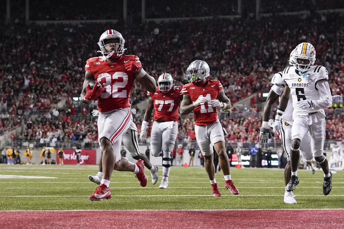 Sep 7, 2024; Columbus, Ohio, USA;  Ohio State Buckeyes running back TreVeyon Henderson (32) runs for a touchdown against the Western Michigan Broncos during the second half at Ohio Stadium.  Mandatory Credit: Adam Cairns-Imagn Images
