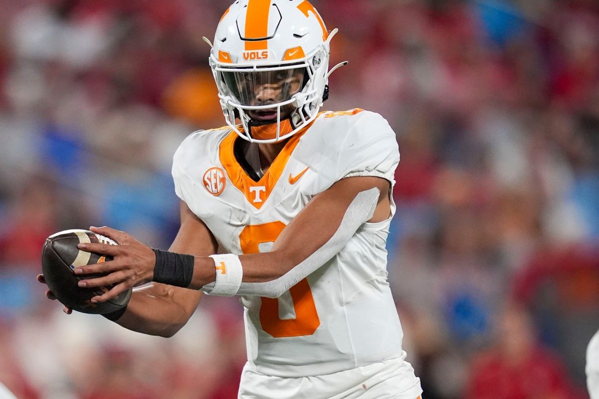 Tennessee quarterback Nico Iamaleava (8) gets the snap during the NCAA College football game against NC State on Saturday, Sept. 7, 2024 in Charlotte, NC.