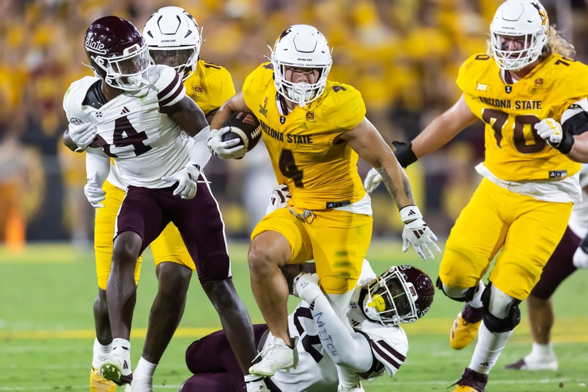 Sep 7, 2024; Tempe, Arizona, USA; Arizona State Sun Devils running back Cam Skattebo (4) against the Mississippi State Bulldogs in the first half at Mountain America Stadium. Mandatory Credit: Mark J. Rebilas-Imagn Images