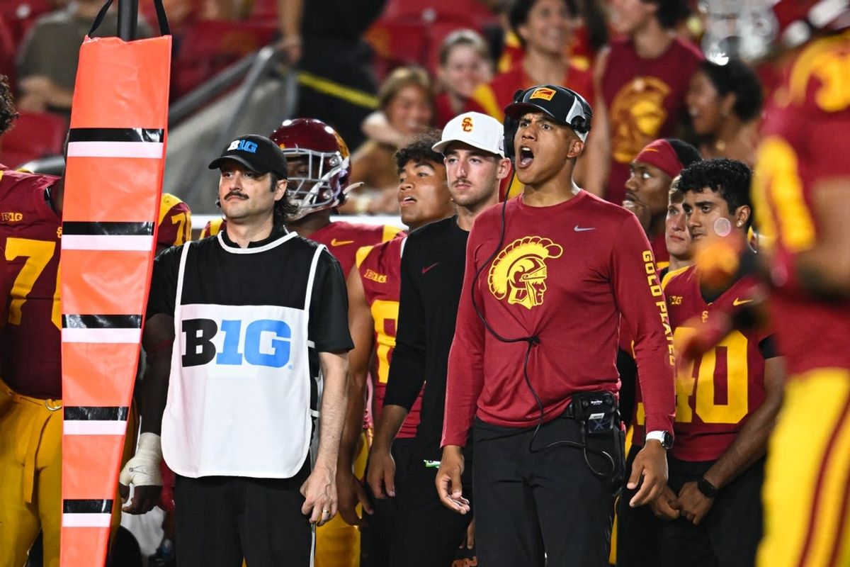 Sep 7, 2024; Los Angeles, California, USA; USC Trojans defensive coordinator D'Anton Lynn reacts against the Utah State Aggies during the fourth quarter at United Airlines Field at Los Angeles Memorial Coliseum. Mandatory Credit: Jonathan Hui-Imagn Images
