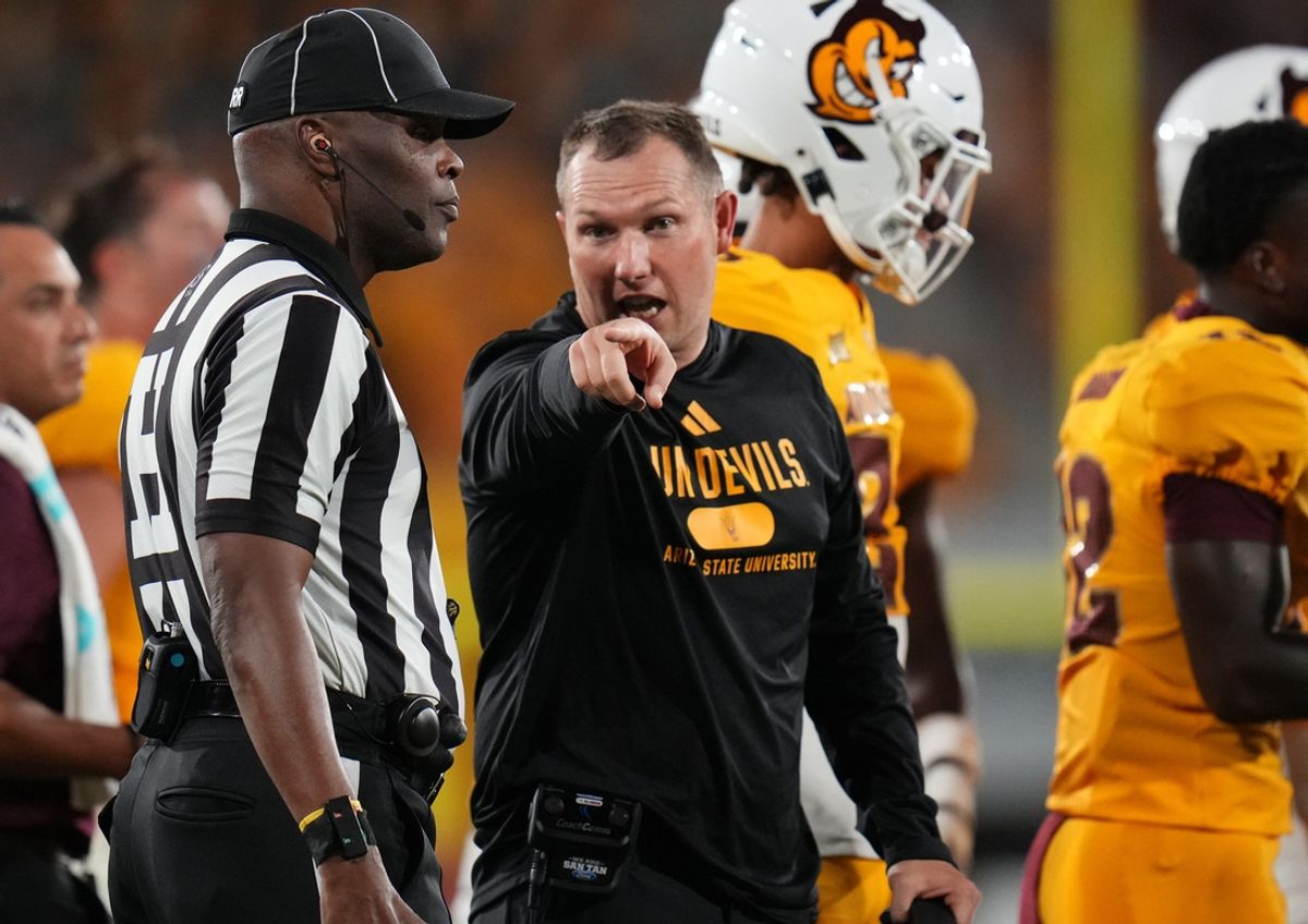 Arizona State head coach Kenny Dillingham speaks with the referee during a game against the Mississippi State Bulldogs at Mountain America Stadium on Sept. 7, 2024, in Tempe.