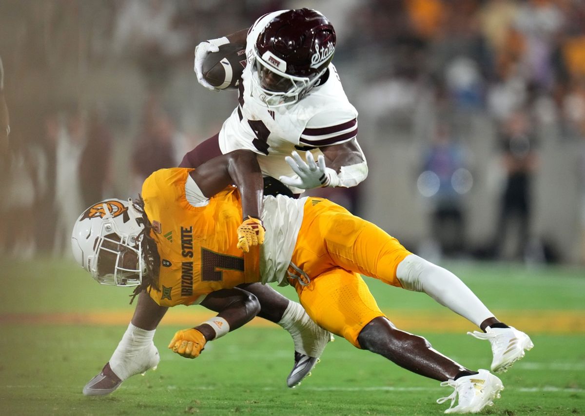 Arizona State defensive back Shamari Simmons (7) tackles Mississippi State Bulldogs running back Keyvone Lee (24) at Mountain America Stadium in Tempe on Sept. 7, 2024.