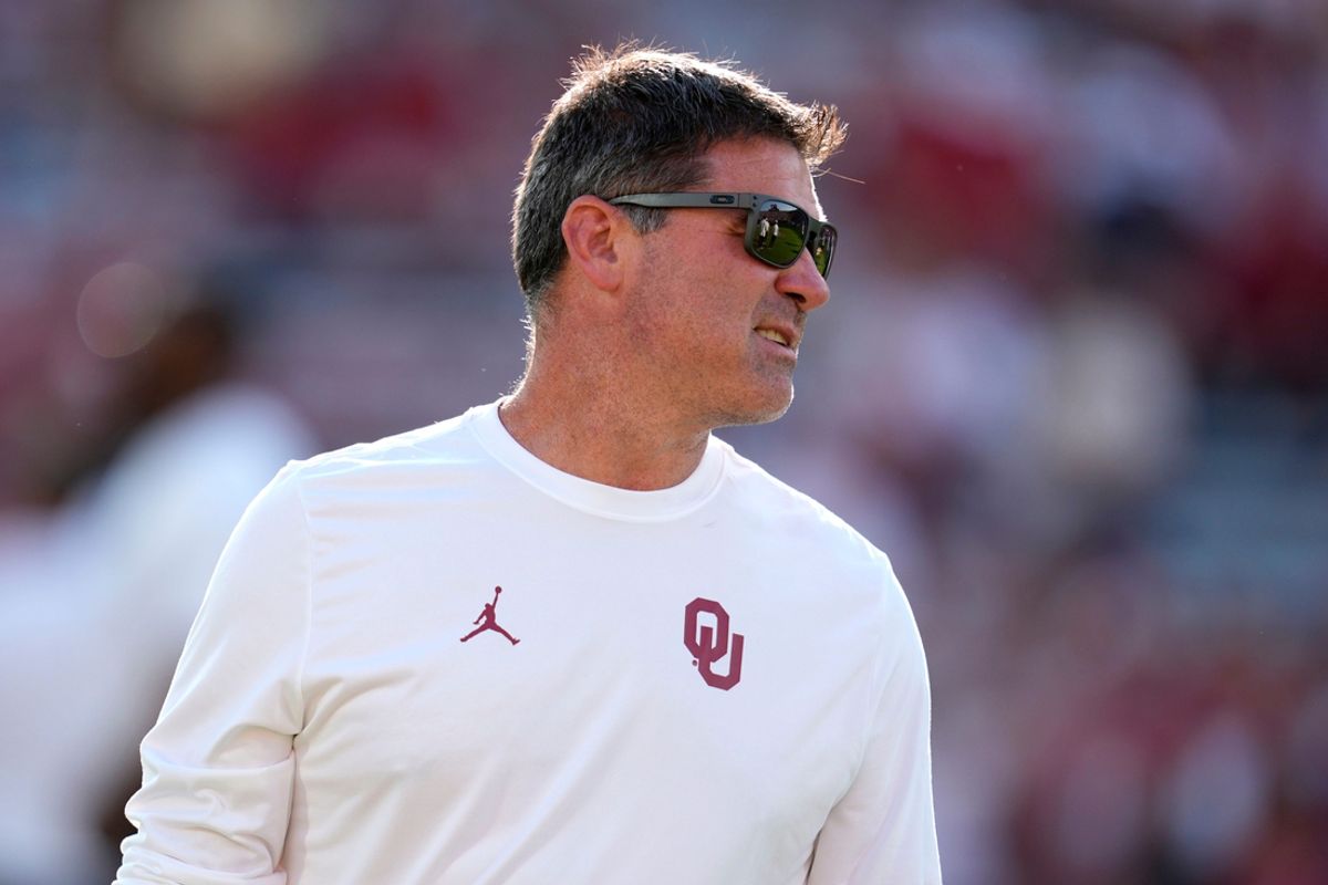 Oklahoma offensive coordinator Seth Littrell walks on the field before a college football game between the University of Oklahoma Sooners (OU) and the Houston Cougars at Gaylord Family – Oklahoma Memorial Stadium in Norman, Okla., Saturday, Sept. 7, 2024.