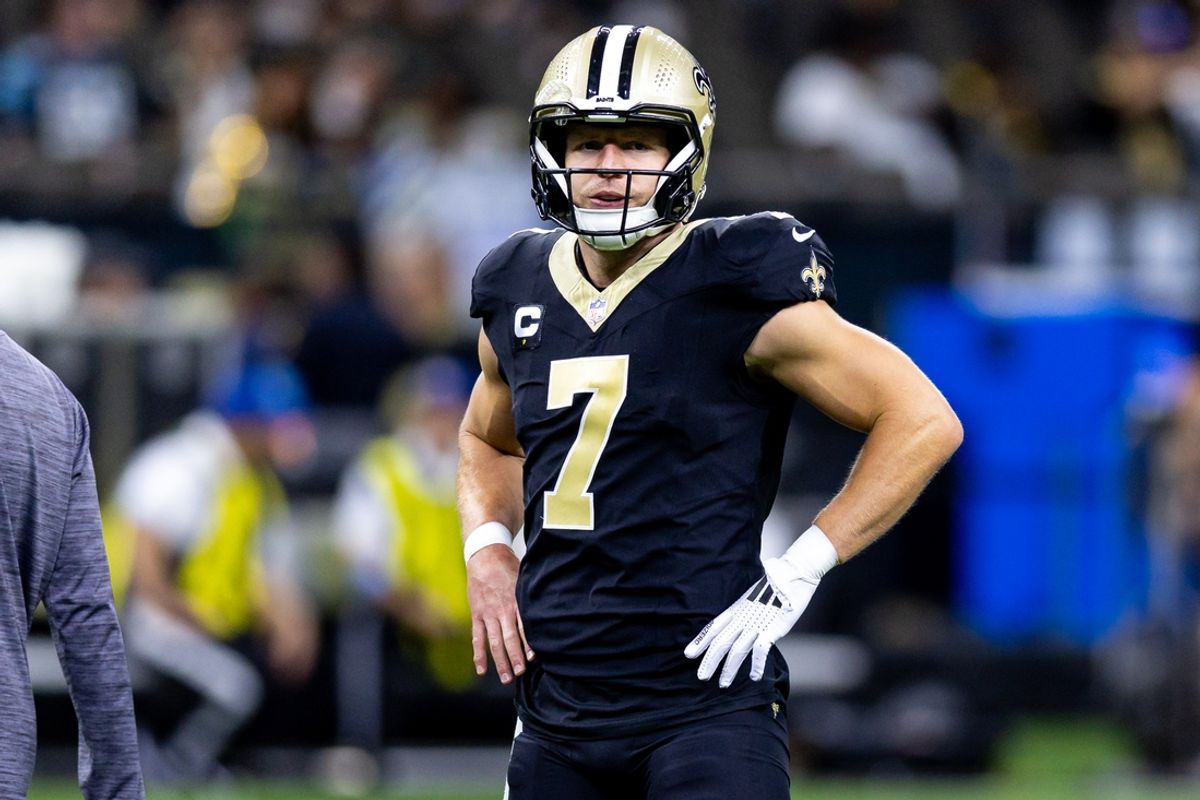 Sep 8, 2024; New Orleans, Louisiana, USA;  New Orleans Saints quarterback Taysom Hill (7) looks on against the Carolina Panthers during the pregame at Caesars Superdome. Mandatory Credit: Stephen Lew-Imagn Images