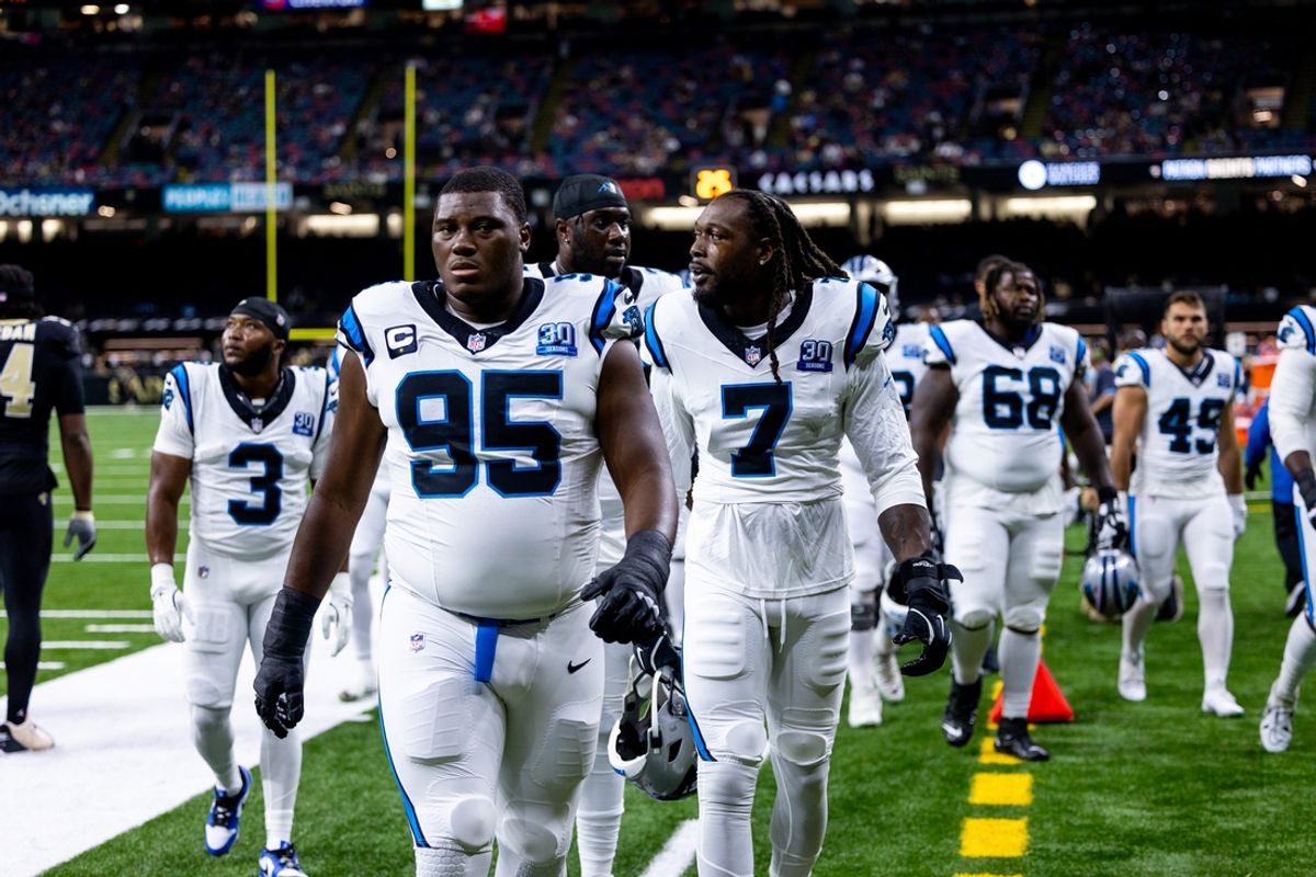 Sep 8, 2024; New Orleans, Louisiana, USA;  Carolina Panthers defensive end Derrick Brown (95) walks off the field before the game against the New Orleans Saints  at Caesars Superdome. Mandatory Credit: Stephen Lew-Imagn Images