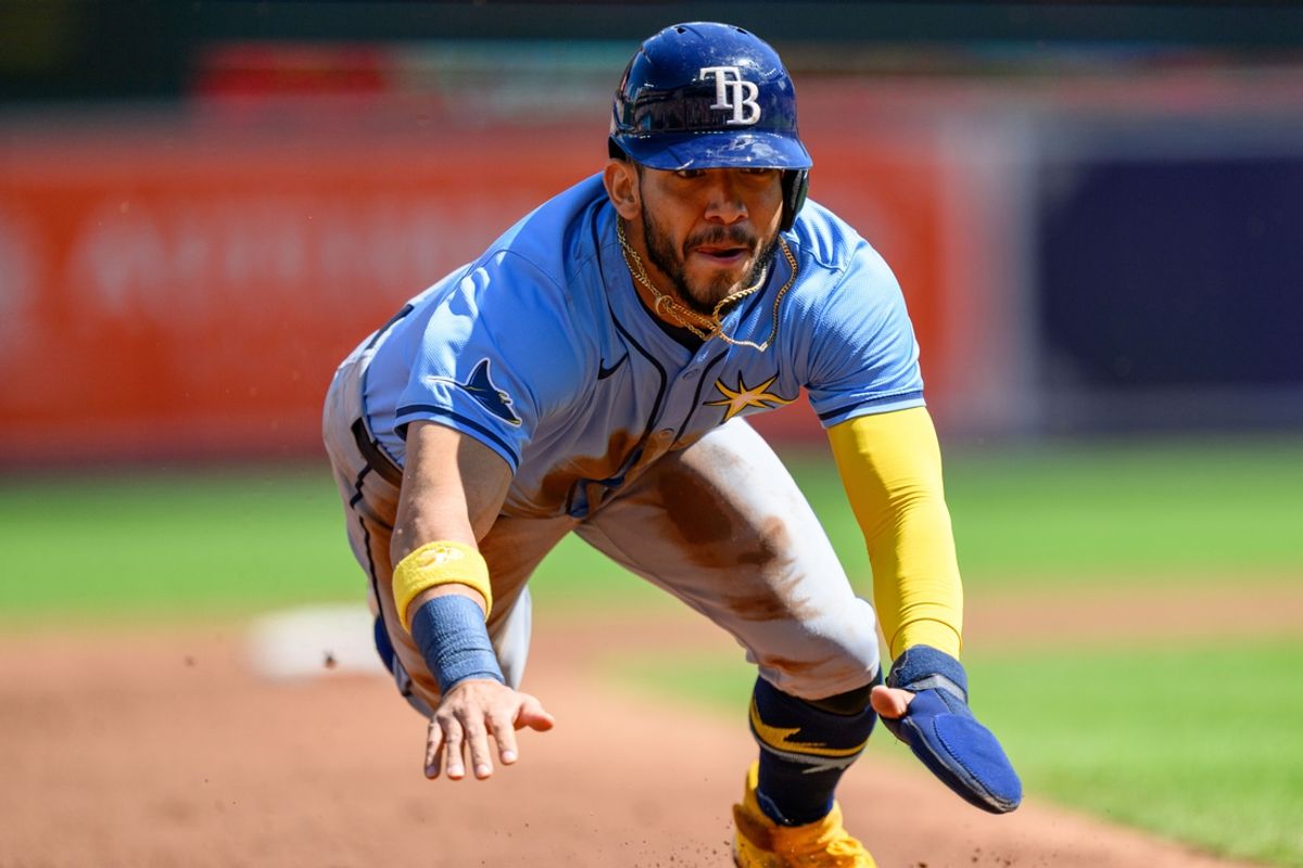 Sep 8, 2024; Baltimore, Maryland, USA; Tampa Bay Rays shortstop José Caballero (7) steals third base during the second inning against the Baltimore Orioles at Oriole Park at Camden Yards. Mandatory Credit: Reggie Hildred-Imagn Images