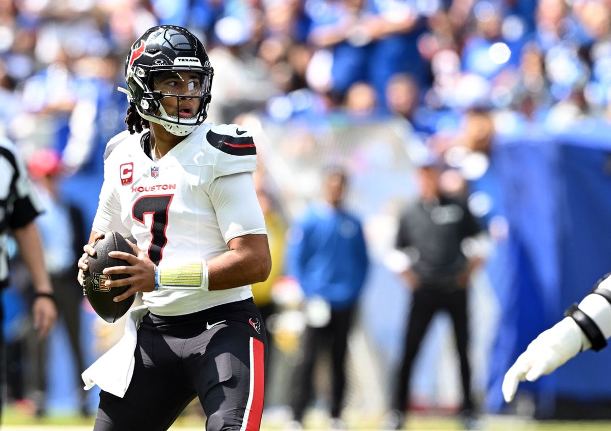 Sep 8, 2024; Indianapolis, Indiana, USA;  Houston Texans quarterback C.J. Stroud (7) looks for a teammate during the first quarter against the Indianapolis Colts at Lucas Oil Stadium. Mandatory Credit: Marc Lebryk-Imagn Images