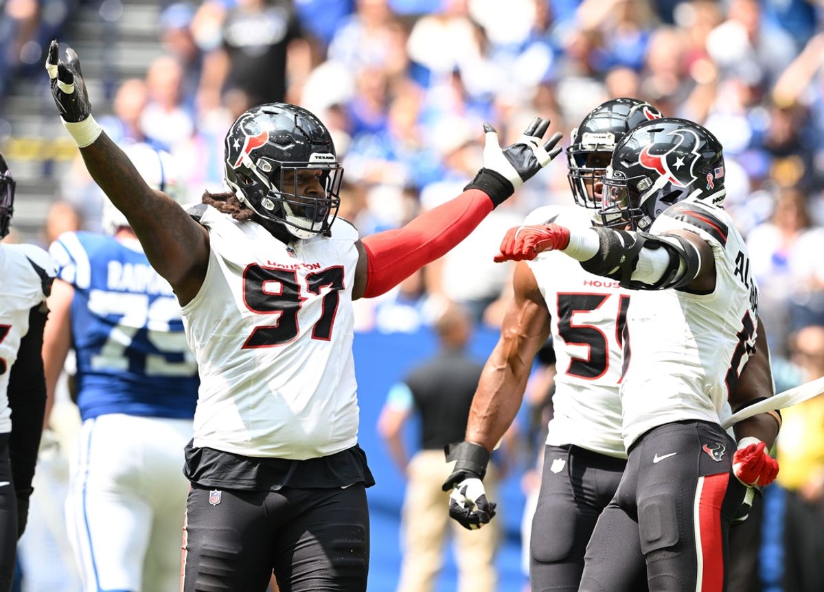 Sep 8, 2024; Indianapolis, Indiana, USA; Houston Texans defensive end Mario Edwards Jr. (97) celebrates a sack during the second quarter against the Indianapolis Colts at Lucas Oil Stadium. Mandatory Credit: Marc Lebryk-Imagn Images