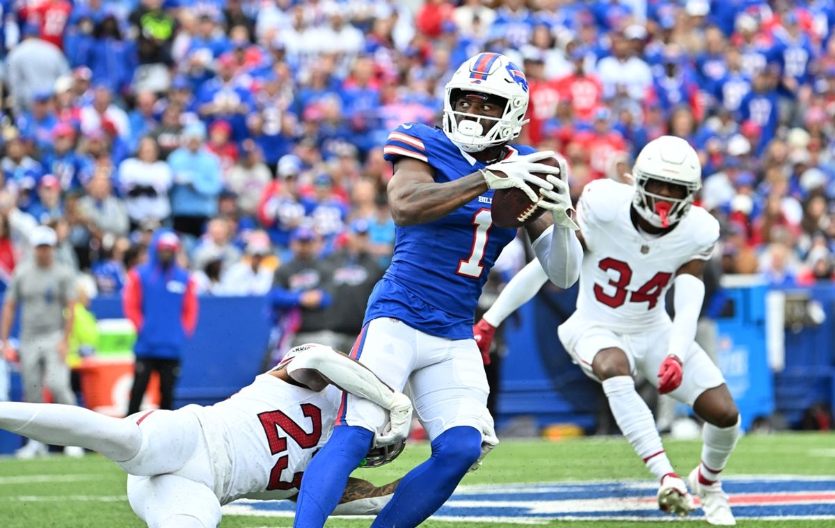 Sep 8, 2024; Orchard Park, New York, USA; Buffalo Bills wide receiver Curtis Samuel (1) is tackled by Arizona Cardinals cornerback Sean Murphy-Bunting (23) after a catch in the second quarter at Highmark Stadium. Mandatory Credit: Mark Konezny-Imagn Images