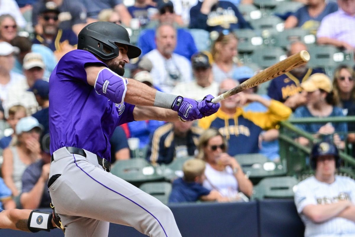 Sep 8, 2024; Milwaukee, Wisconsin, USA;  Colorado Rockies center fielder Sam Hilliard (16) hits a 3-run home run in the fifth inning against the Milwaukee Brewers at American Family Field. Mandatory Credit: Benny Sieu-Imagn Images