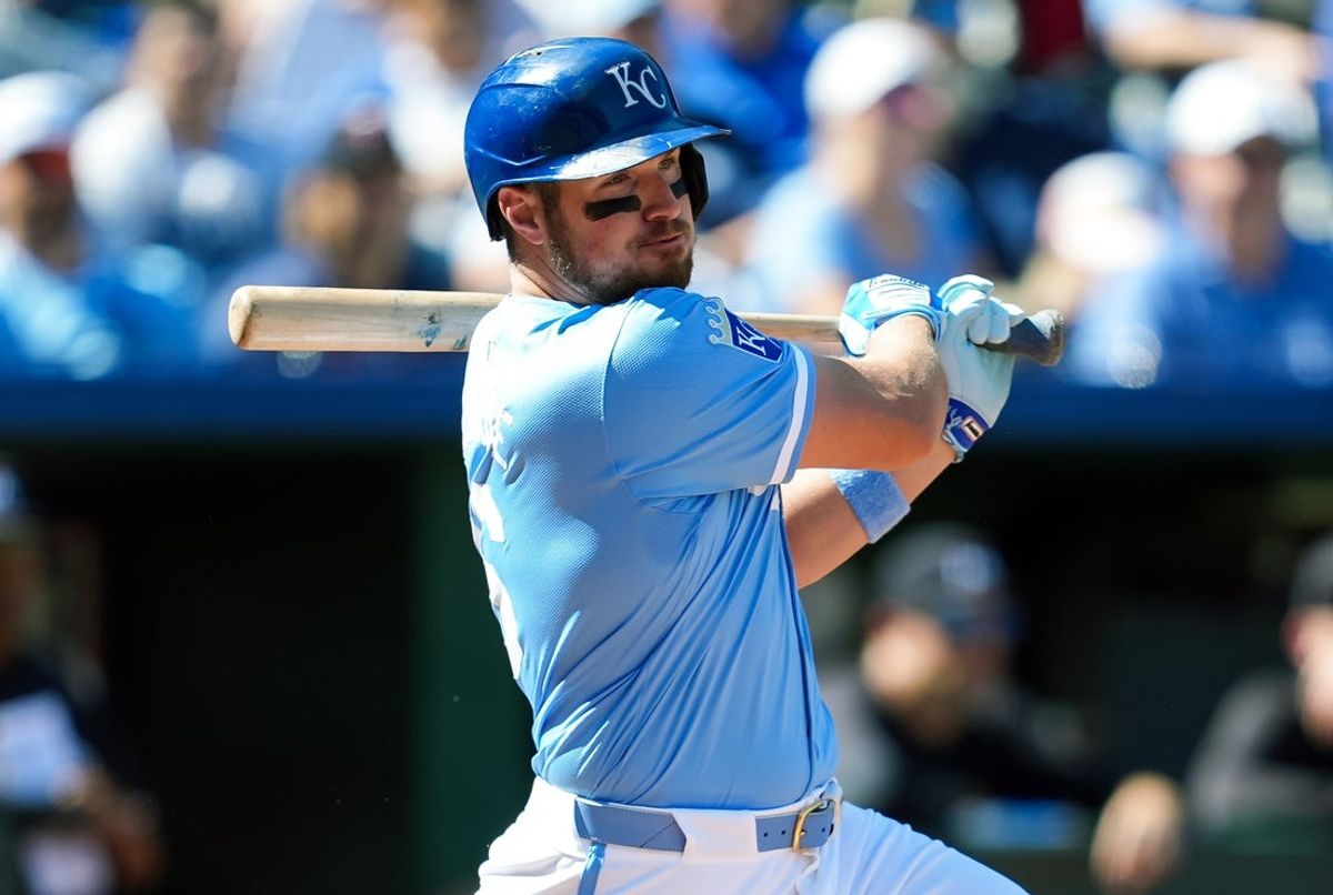 Sep 8, 2024; Kansas City, Missouri, USA; Kansas City Royals right fielder Hunter Renfroe (16) hits a single during the eighth inning against the Minnesota Twins at Kauffman Stadium. Mandatory Credit: Jay Biggerstaff-Imagn Images