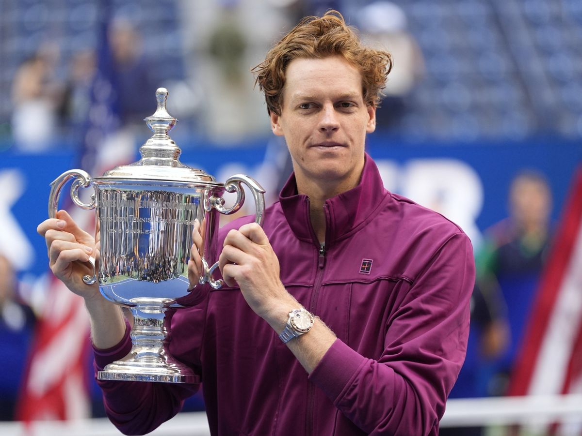 Sep 8, 2024; Flushing, NY, USA; Jannik Sinner (ITA) celebrates with the trophy after defeating Taylor Fritz (USA) in the men’s singles final of the 2024 U.S. Open tennis tournament at USTA Billie Jean King National Tennis Center. Mandatory Credit: Robert Deutsch-Imagn Images