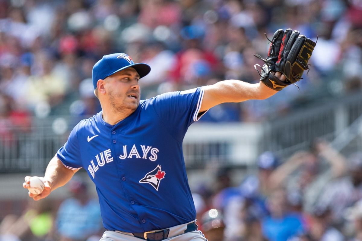 Sep 8, 2024; Cumberland, Georgia, USA; Toronto Blue Jays pitcher Erik Swanson (50) pitches the ball against the Atlanta Braves during the eighth inning at Truist Park. Mandatory Credit: Jordan Godfree-Imagn Images
