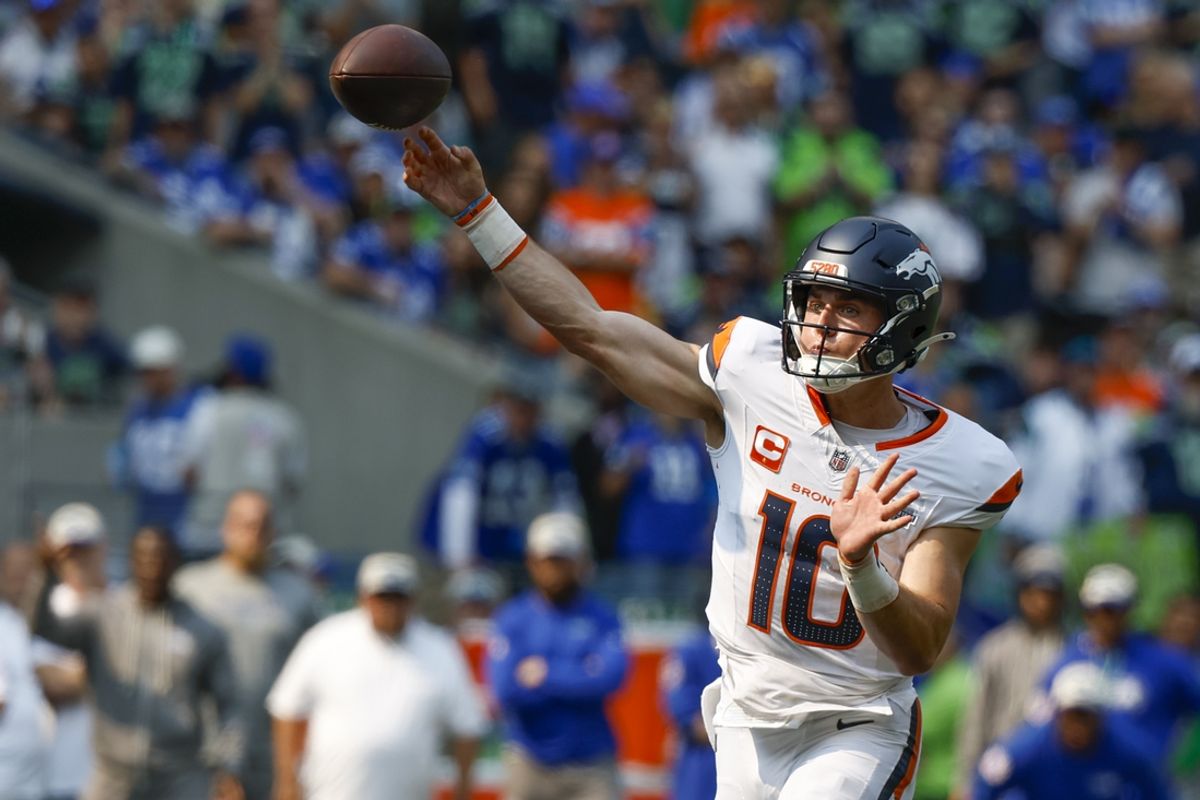 Sep 8, 2024; Seattle, Washington, USA; Denver Broncos quarterback Bo Nix (10) passes against the Seattle Seahawks during the second quarter at Lumen Field. Mandatory Credit: Joe Nicholson-Imagn Images