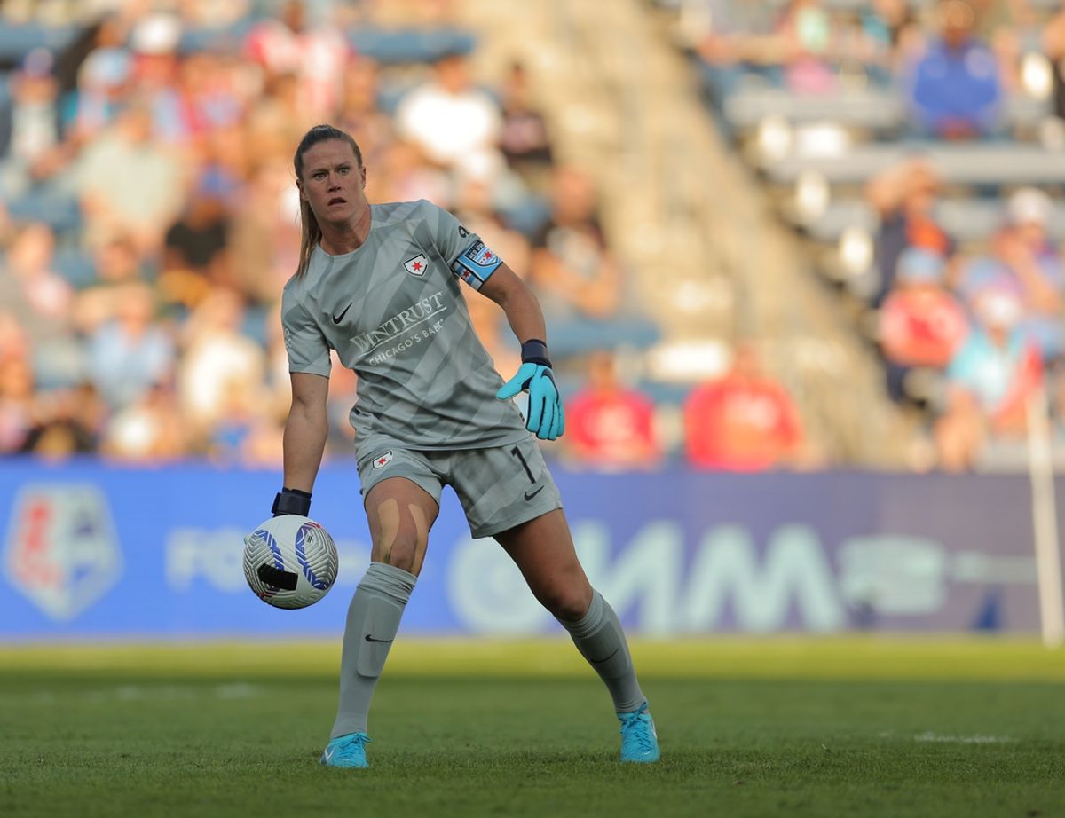 Sep 8, 2024; Bridgeview, Illinois, USA; Chicago Red Stars goalkeeper Alyssa Naeher (1) clears a ball during the first half against the Orlando Pride at SeatGeek Stadium. Mandatory Credit: Melissa Tamez-Imagn Images