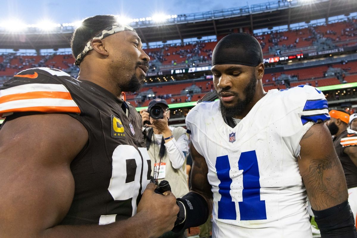 Sep 8, 2024; Cleveland, Ohio, USA; Cleveland Browns defensive end Myles Garrett (95) congratulates Dallas Cowboys linebacker Micah Parsons (11) after the game at Huntington Bank Field. Mandatory Credit: Scott Galvin-Imagn Images