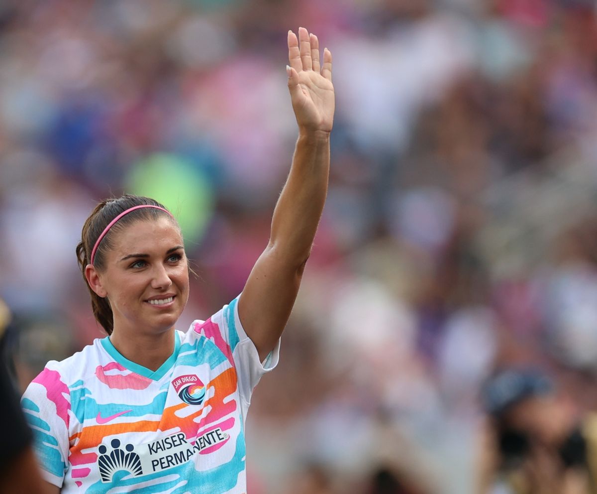 Sep 8, 2024; San Diego, California, USA; San Diego Wave FC forward Alex Morgan (13) waves to fans after being subbed out of her final game during the first half against the North Carolina Courage at Snapdragon Stadium. Mandatory Credit: Abe Arredondo-Imagn Images