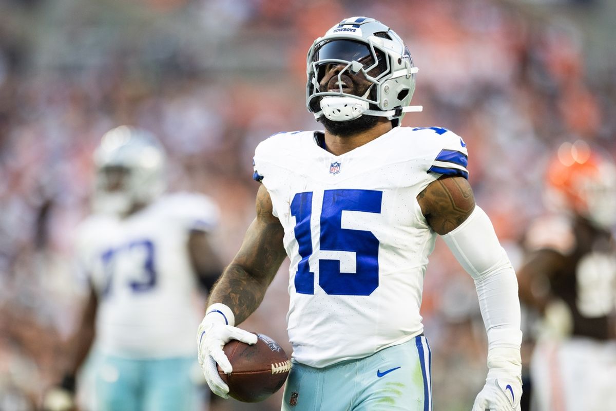 Sep 8, 2024; Cleveland, Ohio, USA; Dallas Cowboys running back Ezekiel Elliott (15) celebrates his first down run against the Cleveland Browns during the fourth quarter at Huntington Bank Field. Mandatory Credit: Scott Galvin-Imagn Images