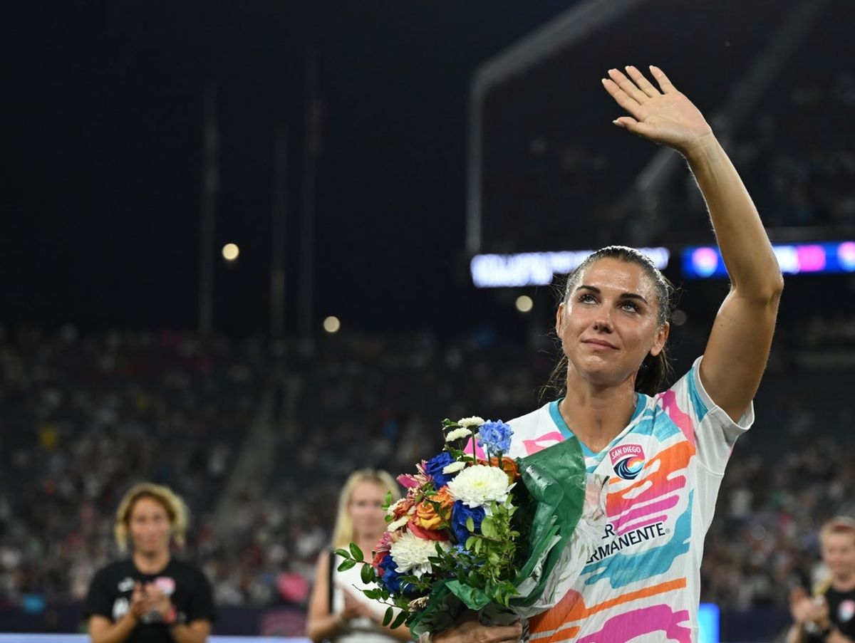 Sep 8, 2024; San Diego, California, USA; San Diego Wave FC forward Alex Morgan (13) waves to fans following her final match before retirement between San Diego Wave FC and the North Carolina Courage at Snapdragon Stadium. Mandatory Credit: Jonathan Hui-Imagn Images