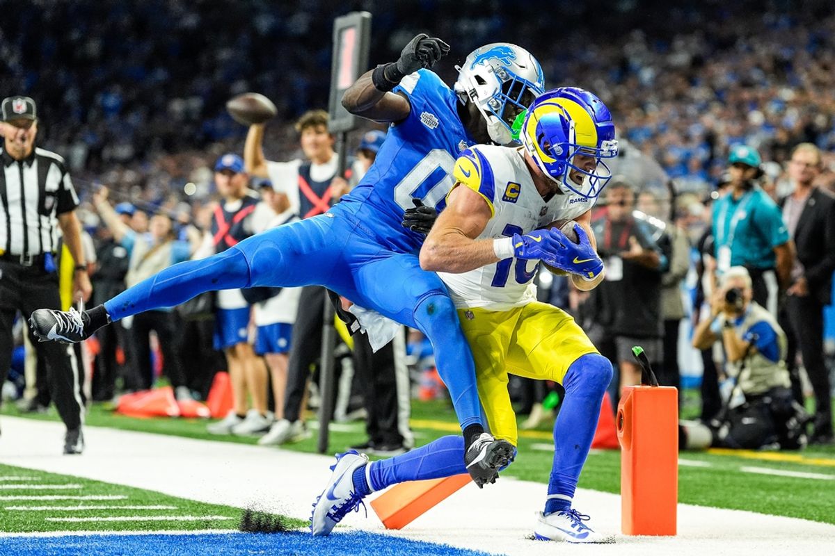 Los Angeles Rams wide receiver Cooper Kupp (10) scores a touchdown against Detroit Lions cornerback Terrion Arnold (0) during the second half at Ford Field in Detroit on Sunday, September 8, 2024.