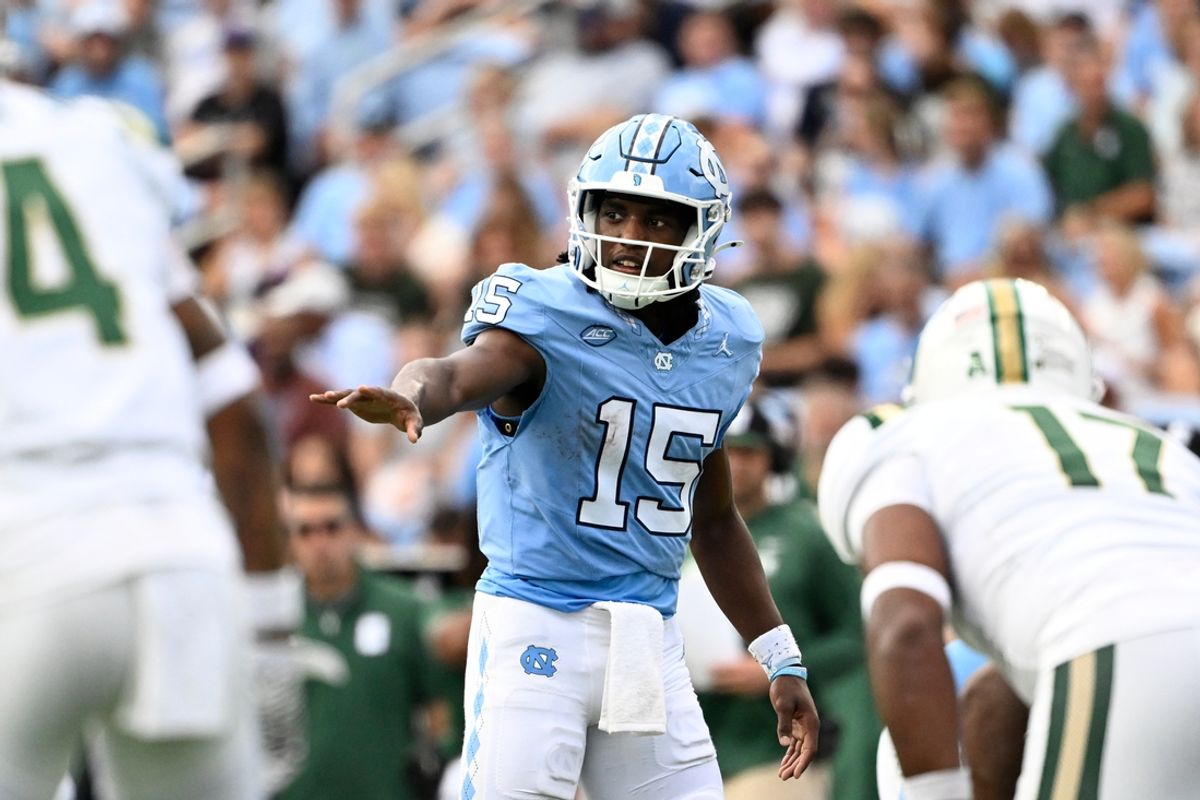 Sep 7, 2024; Chapel Hill, North Carolina, USA; North Carolina Tar Heels quarterback Conner Harrell (15) adjusts the offense in the second quarter at Kenan Memorial Stadium. Mandatory Credit: Bob Donnan-Imagn Images