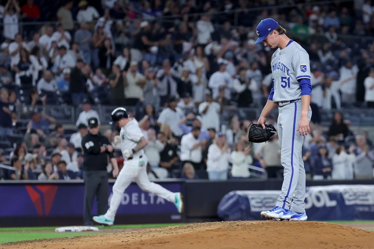 Sep 9, 2024; Bronx, New York, USA; Kansas City Royals starting pitcher Brady Singer (51) reacts after giving up a two run home run to New York Yankees left fielder Alex Verdugo (24) during the fourth inning at Yankee Stadium. Mandatory Credit: Brad Penner-Imagn Images