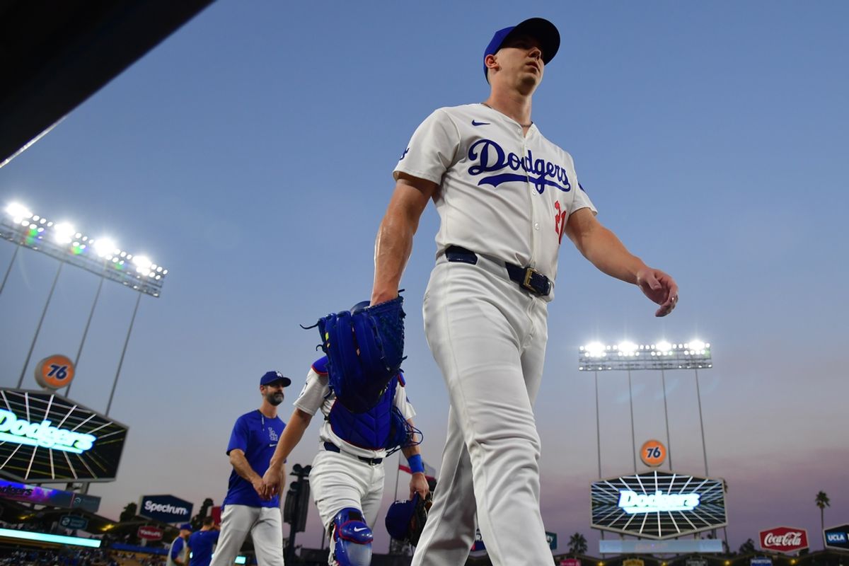 Sep 9, 2024; Los Angeles, California, USA; Los Angeles Dodgers pitcher Walker Buehler (21) before starting against the Chicago Cubs at Dodger Stadium. Mandatory Credit: Gary A. Vasquez-Imagn Images