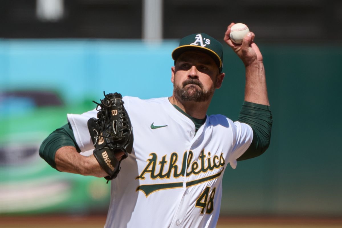 Sep 7, 2024; Oakland, California, USA; Oakland Athletics pitcher T.J. McFarland (48) throws a pitch against the Detroit Tigers during the seventh inning at Oakland-Alameda County Coliseum. Mandatory Credit: Robert Edwards-Imagn Images