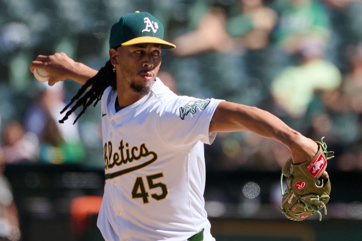 Sep 7, 2024; Oakland, California, USA; Oakland Athletics pitcher Osvaldo Bido (45) throws a pitch against the Detroit Tigers during the ninth inning at Oakland-Alameda County Coliseum. Mandatory Credit: Robert Edwards-Imagn Images