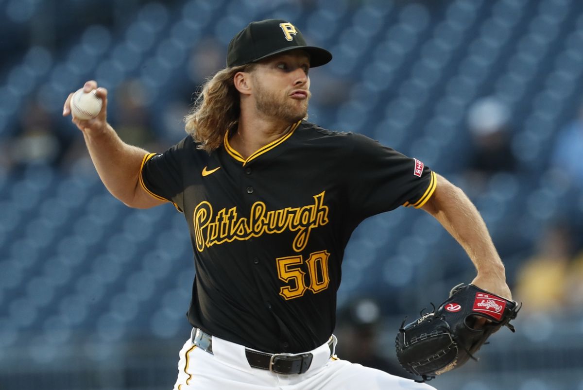Sep 10, 2024; Pittsburgh, Pennsylvania, USA;  Pittsburgh Pirates starting pitcher Carmen Mlodzinski (50) delivers a pitch against the Miami Marlins during the first inning at PNC Park. Mandatory Credit: Charles LeClaire-Imagn Images