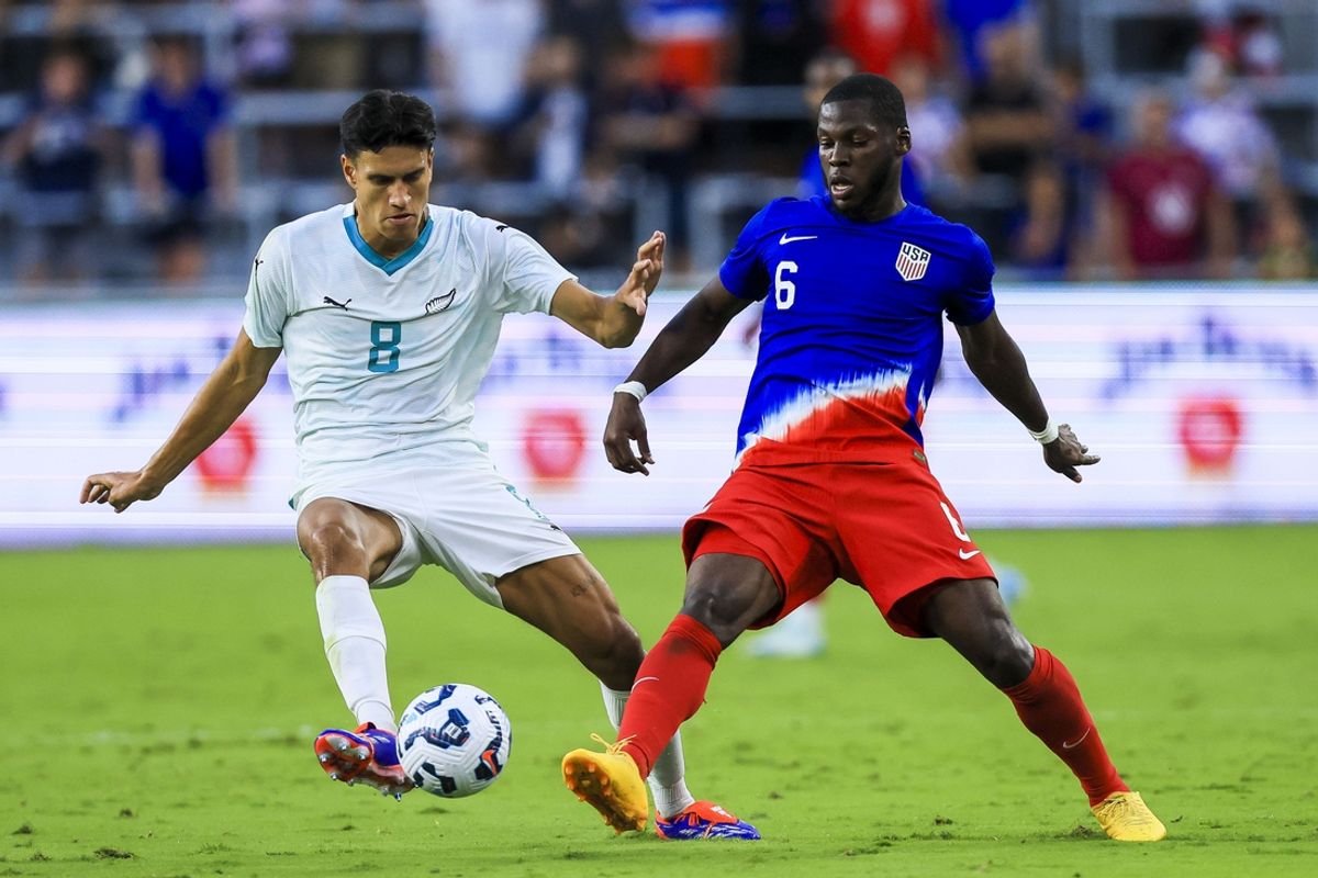 Sep 10, 2024; Cincinnati, Ohio, USA; New Zealand midfielder Marko Stamenic (8) battles for the ball against USA midfielder Yunus Musah (6) in the first half at TQL Stadium. Mandatory Credit: Stratman-Imagn Images