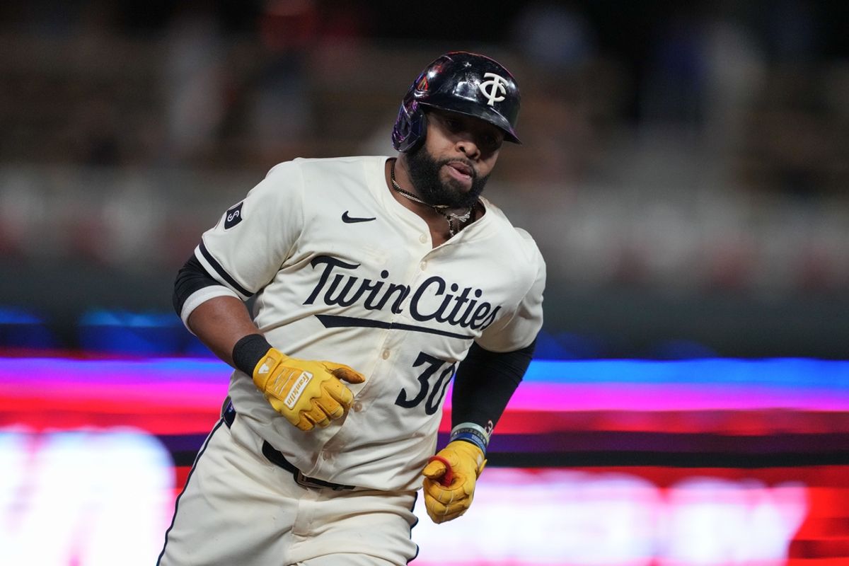 Sep 10, 2024; Minneapolis, Minnesota, USA; Minnesota Twins first baseman Carlos Santana (30) rounds the bases after hitting a two-run home run during the fifth inning against the Los Angeles Angels at Target Field. Mandatory Credit: Jordan Johnson-Imagn Images