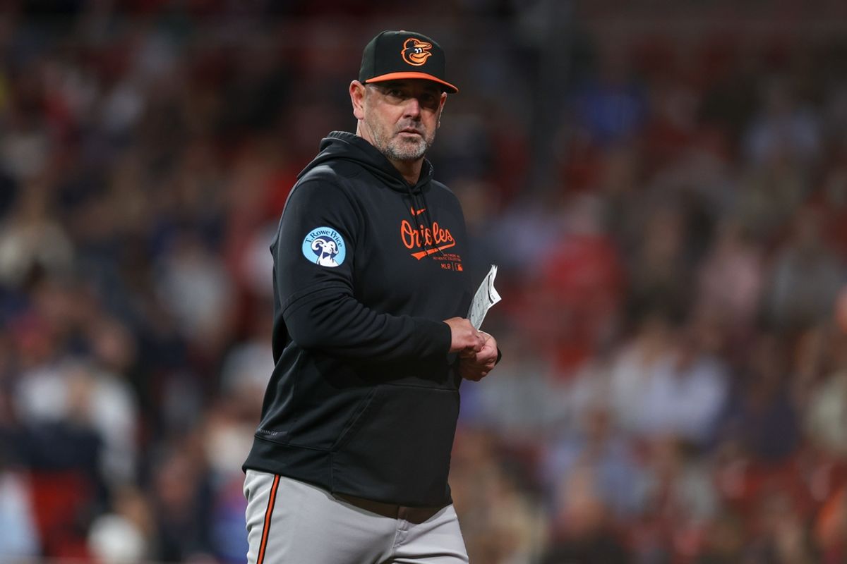 Sep 10, 2024; Boston, Massachusetts, USA; Baltimore Orioles manager Brandon Hyde (18) reacts during the eighth inning against the Boston Red Sox at Fenway Park. Mandatory Credit: Paul Rutherford-Imagn Images