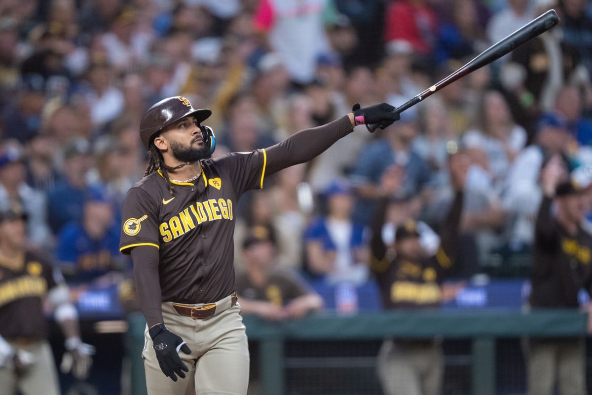 Sep 10, 2024; Seattle, Washington, USA;  San Diego Padres right fielder Fernando Tatis Jr. (23) reacts after hitting a three-run home run during the third inning against the Seattle Mariners at T-Mobile Park. Mandatory Credit: Stephen Brashear-Imagn Images