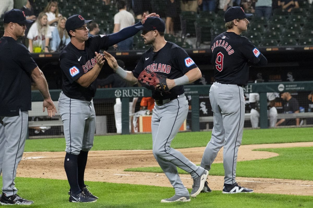 Sep 10, 2024; Chicago, Illinois, USA;  Cleveland Guardians outfielder Lane Thomas (8), center, celebrates with teammates after the game against the Chicago White Sox at Guaranteed Rate Field. Mandatory Credit: Matt Marton-Imagn Images