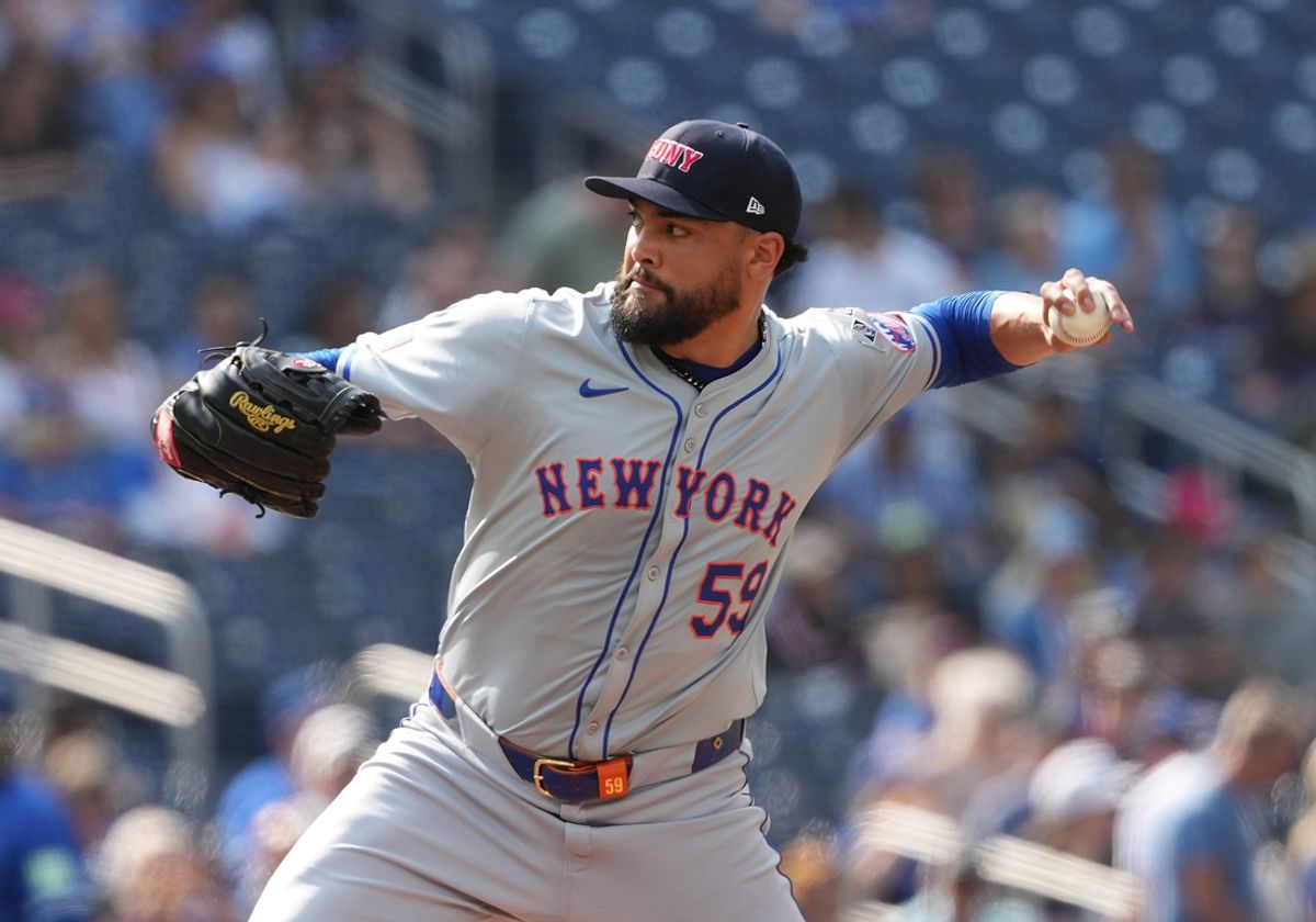 Sep 11, 2024; Toronto, Ontario, CAN; New York Mets starting pitcher Sean Manaea (59) throws a pitch against the Toronto Blue Jays during the first inning at Rogers Centre. Mandatory Credit: Nick Turchiaro-Imagn Images