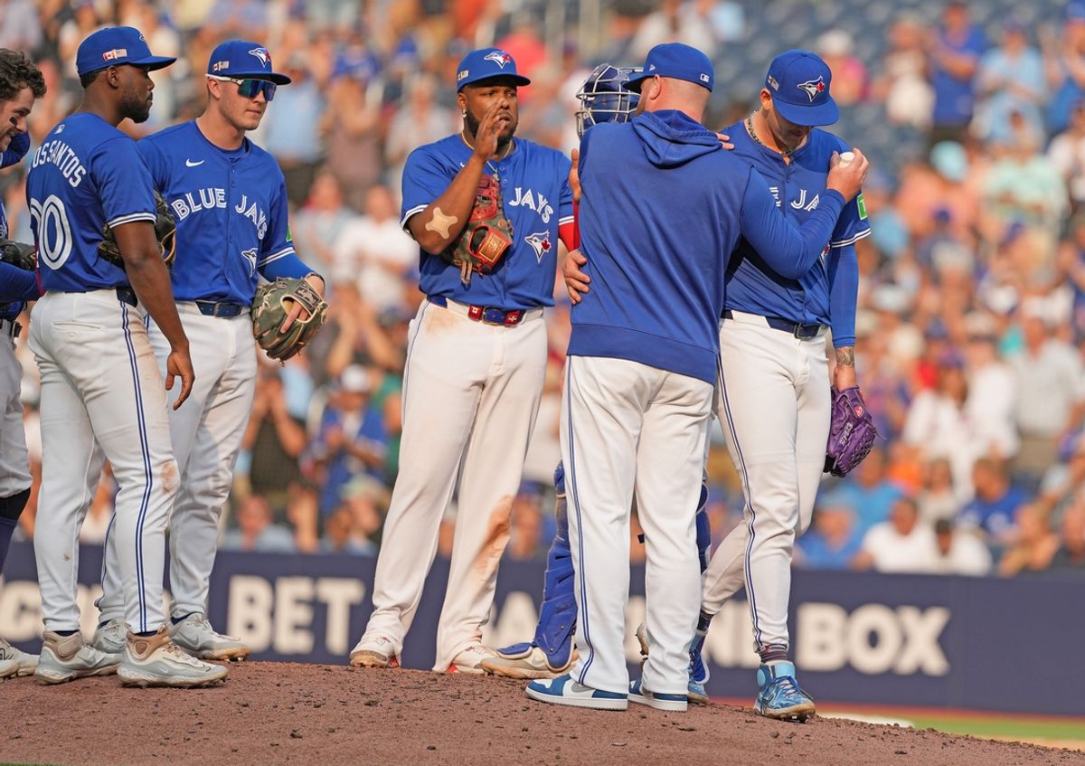 Sep 11, 2024; Toronto, Ontario, CAN; Toronto Blue Jays pitcher Bowden Francis (44) is relieved by manager John Schneider (14) against the New York Mets during the ninth inning at Rogers Centre. Mandatory Credit: Nick Turchiaro-Imagn Images