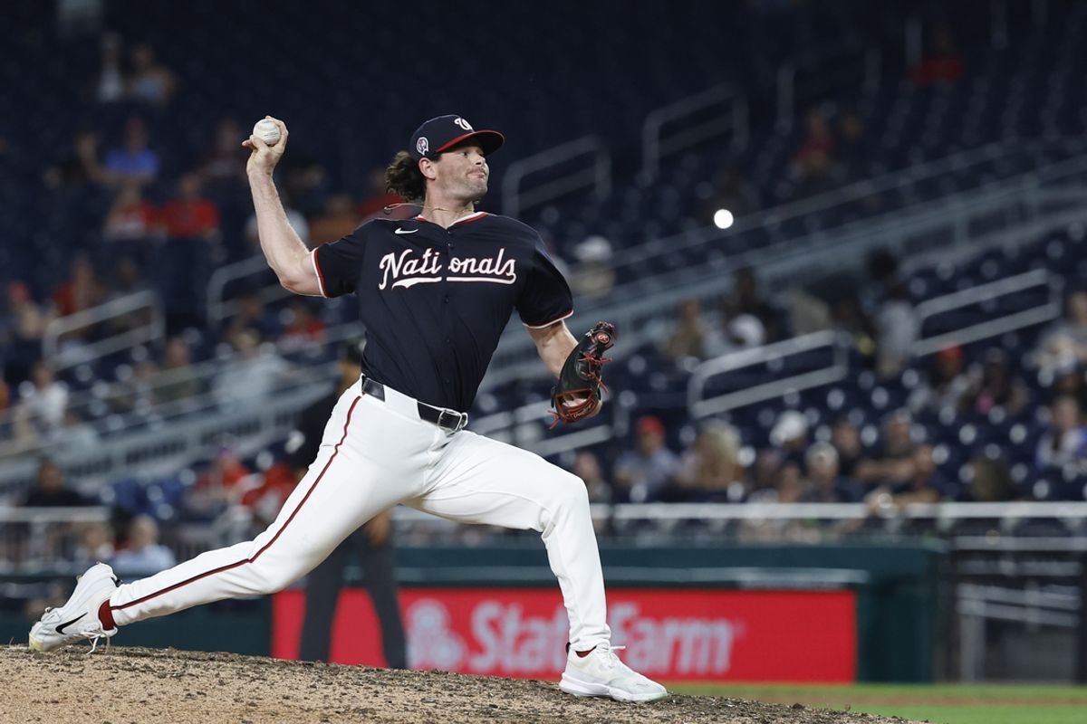 Sep 11, 2024; Washington, District of Columbia, USA; Washington Nationals relief pitcher Kyle Finnegan (67) pitches against the Atlanta Braves during the ninth inning at Nationals Park. Mandatory Credit: Geoff Burke-Imagn Images